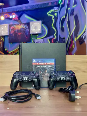 Ex UK PlayStation 4 Slim with 2 Controllers + Uncharted
