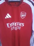 Arsenal Jersey Ya Mikono Mirefu Nyumbani Msimu 2026/27 - 1