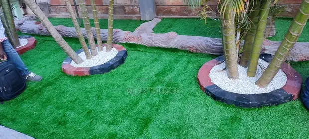 Green Artificial Grass Carpet for Landscaping and Outdoor Projects - 1