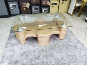 Tempered Glass Coffee Table with Brown Ottomans