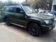 Toyota Land Cruiser 1998 Kijani - 1