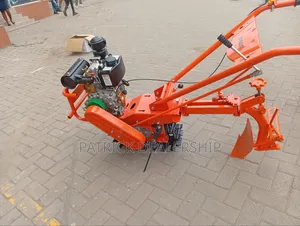 Emas Power Tiller with Plough Attachment
