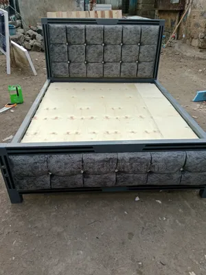 5x6 Gray Bed with Black Stripes and Silver Buttons