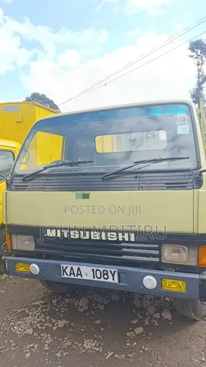 Mitsubishi FH 100 Mini Truck 1990 Yellow