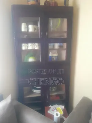 Used Brown Wooden Corner Cupboard