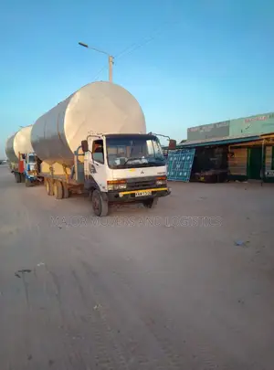 Mguu Kumi Lowloader kwa Usafirishaji wa Mizigo Mipana