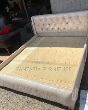 Cream Bed 5x6 with Short Tufted Headboard