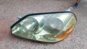 Headlight ya Toyota Mark II GX110 (Koito 22-301)