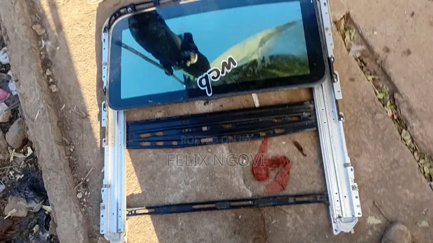 Car Door Lock & Sunroof Repair - 1