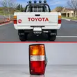 Toyota Hilux YN55/YN65 Pickup Tail Lamp Assembly (1984-1987) - Black RHS - 1
