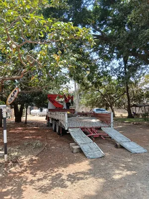 Low Loader 10 Wheeler kwa Ajili