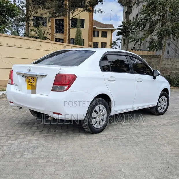 Toyota Axio 2014 Nyeupe - 1