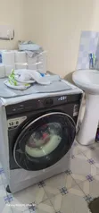 TCL 12kg Mashine ya Kufulia ya Mbele - 1