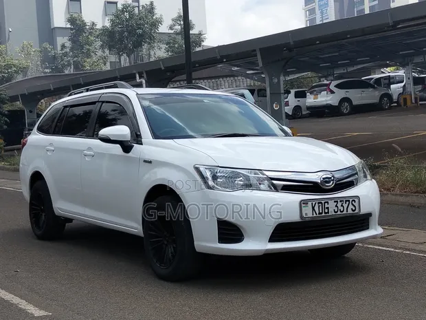 Toyota Corolla Fielder 1.5 Hybrid FWD 2014 Pearl - 1