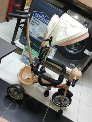 Brown Children's Tricycle with Parent Handle