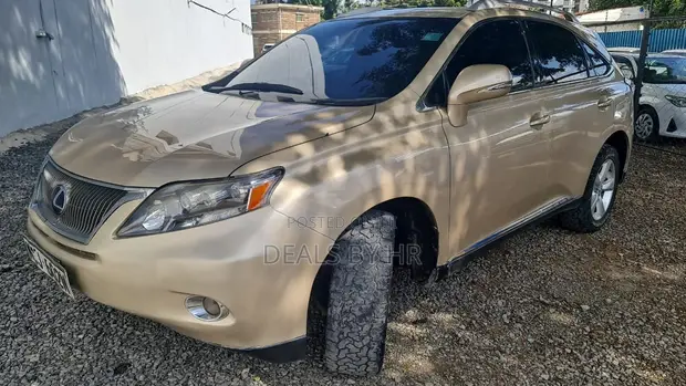 Lexus RX 450h 2010 Dhahabu - 1