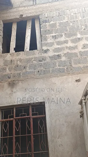 4-Bedroom Bungalow with 4 Shops for Sale in Savannah Estate