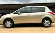 Nissan Tiida 2010 Dhahabu - 5