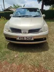 Nissan Tiida 1.5L 16V 2010 Gold - 1