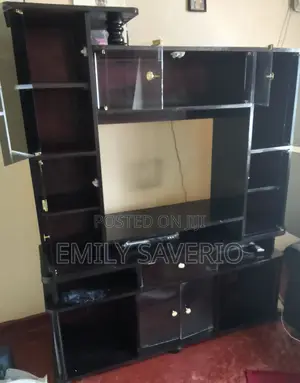 Brown Wall Unit with Open and Closed Shelves