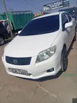 Toyota Axio 2009 Nyeupe - 1
