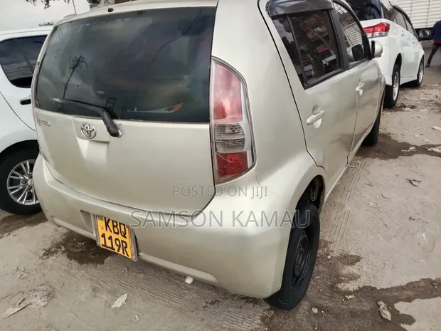 Toyota Passo 2006 Beige - 1