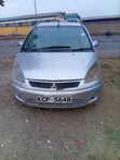 Mitsubishi Colt 2010 Nyeupe - 1