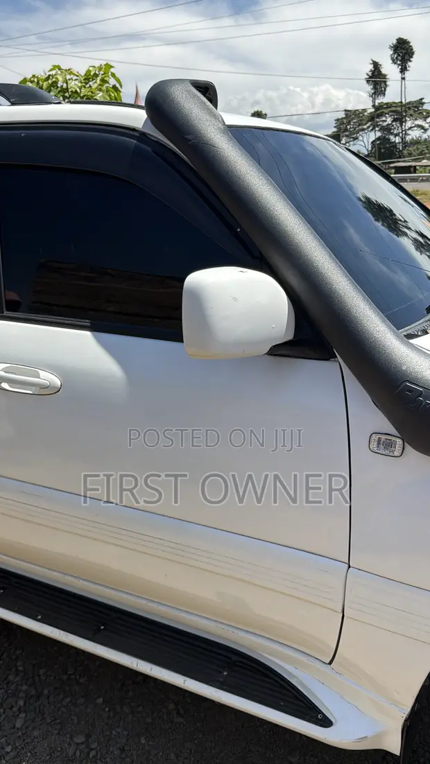 Toyota Land Cruiser HDJ 100 2000 White - 1