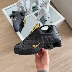 Nike Shox R4 Black Gold Leather Sneakers