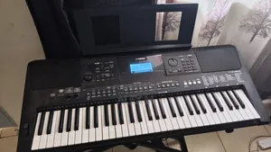 Yamaha PSR-E463 Portable Keyboard with Sustain Pedal