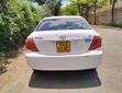 Toyota Axio 2009 Nyeupe - 1