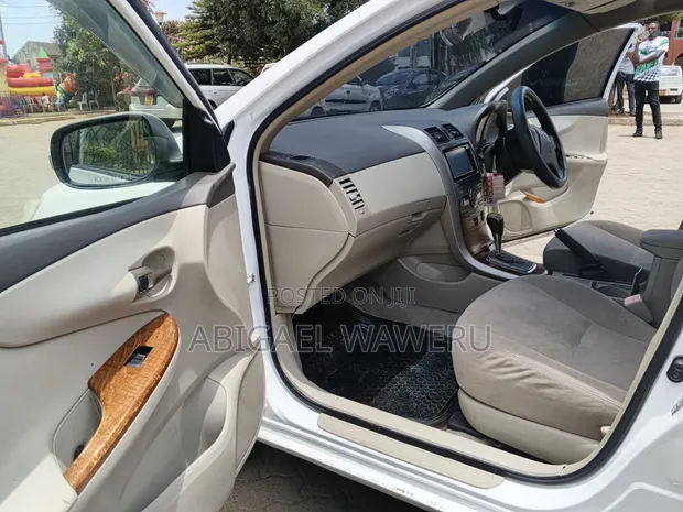 Toyota Axio 1.5 G 2WD 2011 Nyeupe - 1