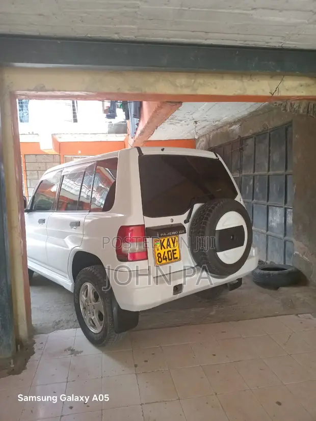 Mitsubishi Pajero IO 2000 Rangi ya Loti - 1