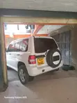 Mitsubishi Pajero IO 2000 Rangi ya Loti - 1