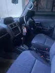 Mitsubishi Pajero IO 2000 Rangi ya Loti - 3