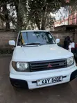 Mitsubishi Pajero IO 2000 Rangi ya Loti - 4