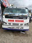 Isuzu NPR Flatbed Truck - 1