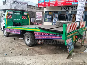 Isuzu NPR Flatbed Truck