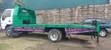 Isuzu NPR Flatbed Truck - 5