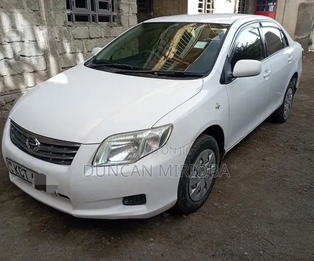 Toyota Axio 2012 Nyeupe - 1