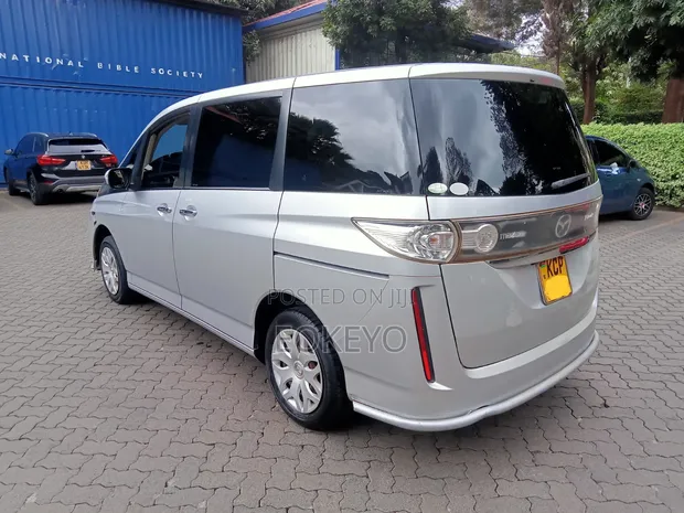 Mazda Biante 2010 Silver - 1