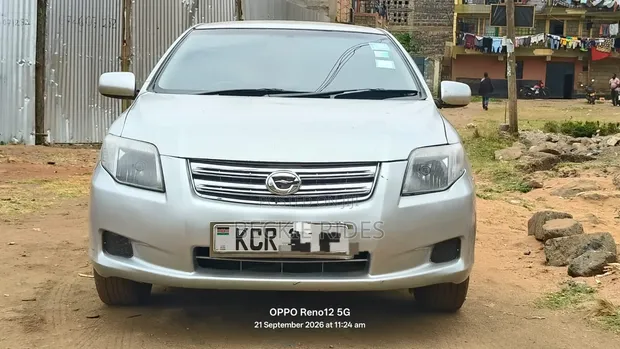 Toyota Axio 2011 Nyeupe - 1
