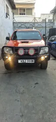 Toyota Hilux 2.5 Cab Pickup 2005 Rangi ya Chungwa - 1
