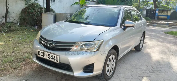 Toyota Axio 2010 Nyeusi - 1