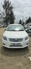 Toyota Axio 2009 Nyeupe - 1