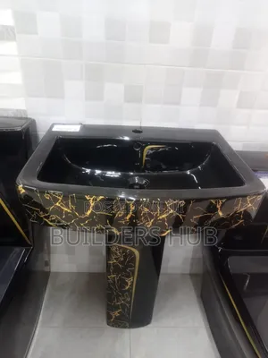 Black Hand Wash Basin with Gold Pedestal