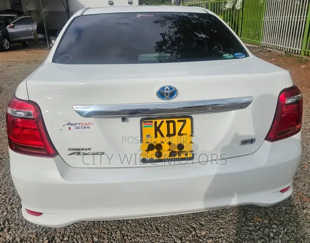 Toyota Axio 1.5 Hybrid 2WD 2019 White - 1