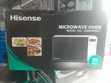 Hisense Microwave Kidogo Kidogo Nyeupe 20L - 2