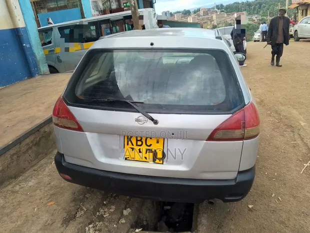 Nissan Wingroad 2002 Nyeupe - 1