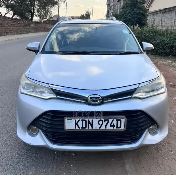 Toyota Corolla Fielder 2017 Nyeusi - 1